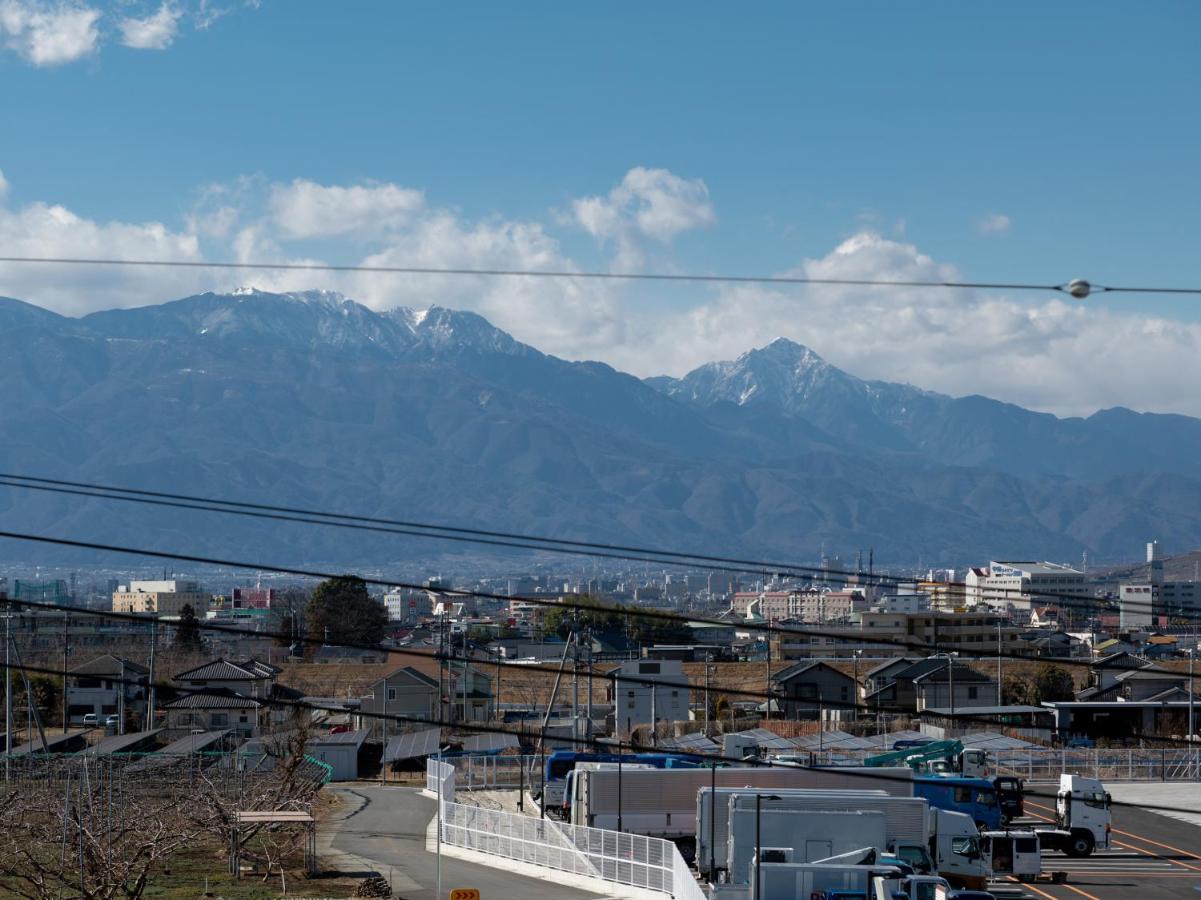 Raku Serina Hotel Fuefuki Bagian luar foto